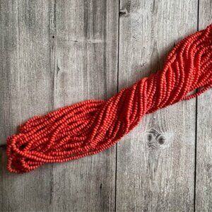 Multi- Strand of Coral Colored Glass Seed Beads